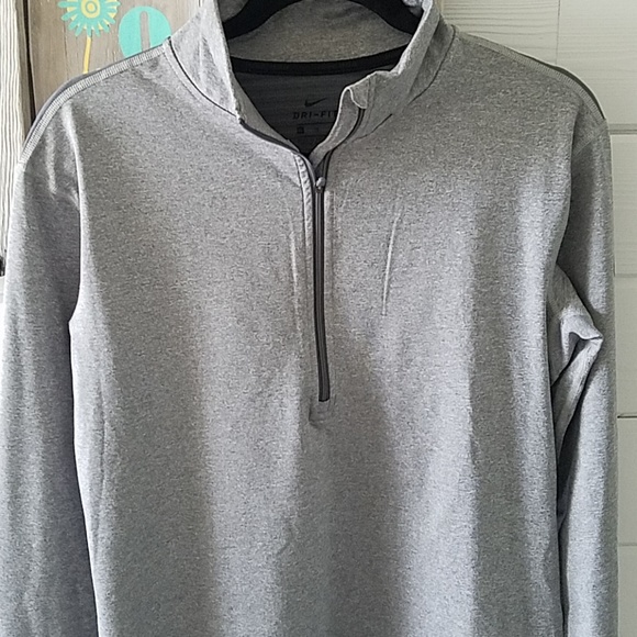 Nike Tops - *FIRM*NWOT Nike Dri Fit pull over (women's)